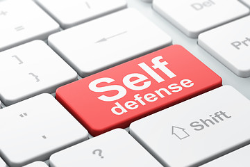 Image showing Safety concept: Self Defense on computer keyboard background