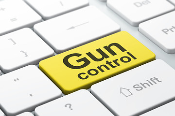 Image showing Privacy concept: Gun Control on computer keyboard background