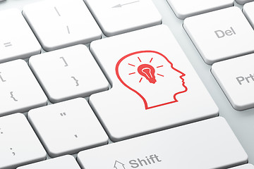 Image showing Advertising concept: Head Whis Lightbulb on computer keyboard ba