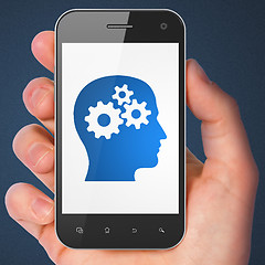 Image showing Data concept: Head With Gears on smartphone