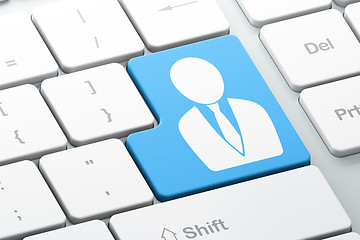 Image showing Marketing concept: Business Man on computer keyboard background
