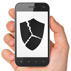 Image showing Security concept: Broken Shield on smartphone