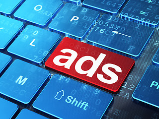 Image showing Advertising concept: Ads on computer keyboard background