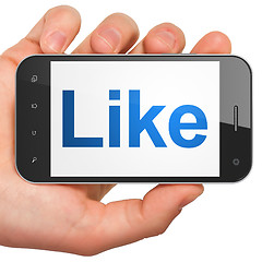 Image showing Social network concept: Like on smartphone