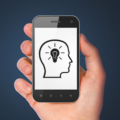 Image showing Information concept: Head Whis Lightbulb on smartphone