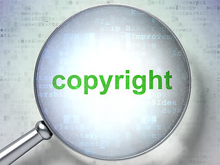 Image showing Marketing concept: Copyright with optical glass