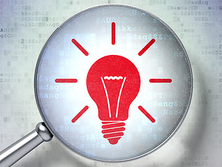 Image showing Business concept:  Light Bulb with optical glass on digital back