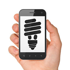 Image showing Business concept: smartphone with Energy Saving Lamp.