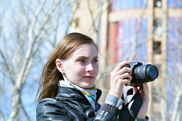 Image showing Woman with camera