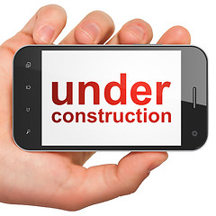 Image showing Web design SEO concept: smartphone with Under Construction