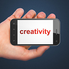 Image showing Advertising concept: smartphone with Creativity