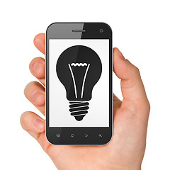 Image showing Business concept: smartphone with Light Bulb.