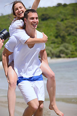 Image showing happy couple have fun on the beach