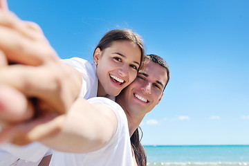 Image showing happy couple have fun on the beach