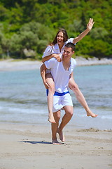 Image showing happy couple have fun on the beach