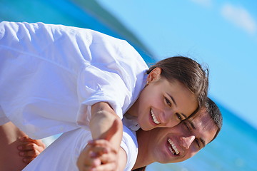 Image showing happy couple have fun on the beach