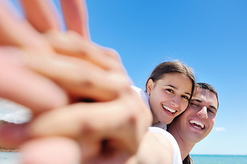 Image showing happy couple have fun on the beach