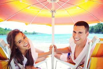 Image showing happy couple have fun on the beach