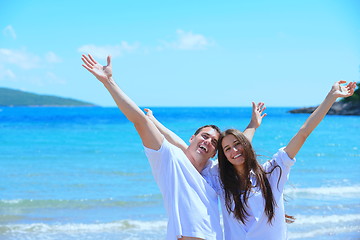 Image showing happy couple have fun on the beach