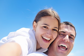 Image showing happy couple have fun on the beach