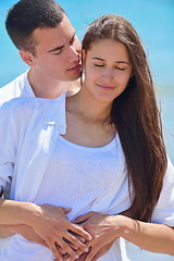 Image showing happy couple have fun on the beach