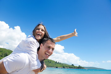 Image showing happy couple have fun on the beach