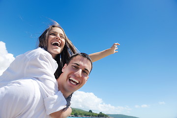 Image showing happy couple have fun on the beach