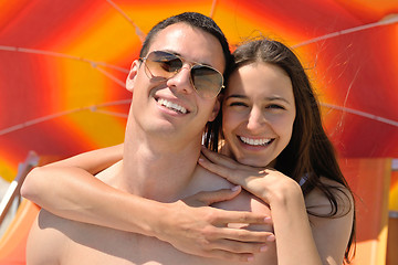 Image showing happy couple have fun on the beach