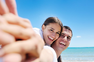 Image showing happy couple have fun on the beach