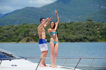 Image showing young couple on yacht