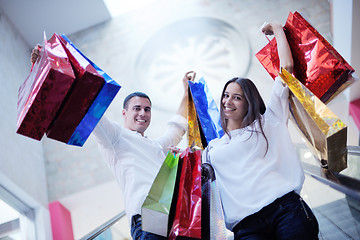 Image showing happy young couple in shopping