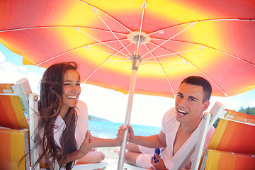 Image showing happy couple have fun on the beach