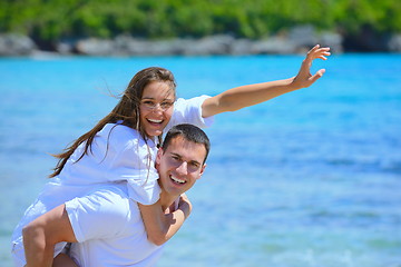 Image showing happy couple have fun on the beach