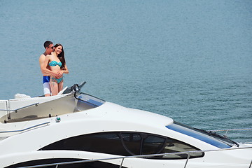 Image showing young couple on yacht