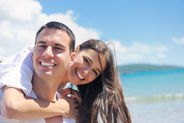 Image showing happy couple have fun on the beach