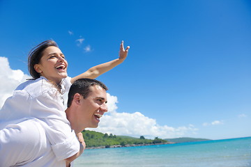 Image showing happy couple have fun on the beach