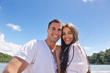 Image showing happy couple have fun on the beach