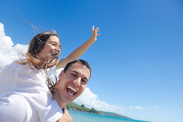 Image showing happy couple have fun on the beach