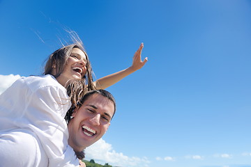 Image showing happy couple have fun on the beach