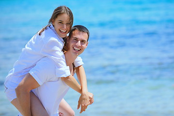 Image showing happy couple have fun on the beach