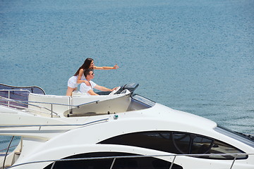 Image showing young couple on yacht