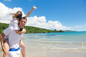 Image showing happy couple have fun on the beach