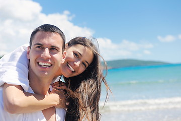 Image showing happy couple have fun on the beach