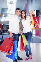 Image showing happy young couple in shopping