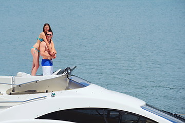 Image showing young couple on yacht