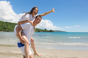 Image showing happy couple have fun on the beach