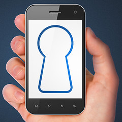Image showing Security concept: smartphone with Keyhole.