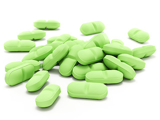 Image showing Green pills on white background