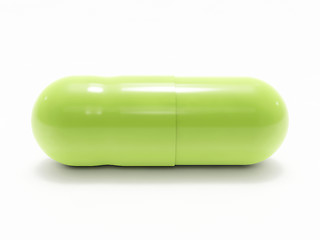 Image showing Green pill on white