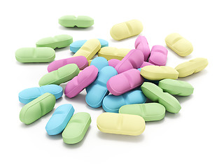 Image showing Many colored pills on white